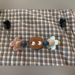 BabyBjorn pastel bouncer toy bar googly eyes flowers pink blue